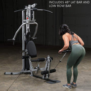 Female athlete uses cable row on Powerline by Body-Solid BSG10X Home Gym