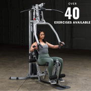 Female athlete does chest press on Powerline by Body-Solid BSG10X Home Gym