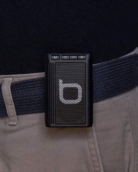 Black Bumpboxx Bluetooth Retro Pager Beeper clipped on belt. 