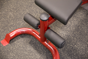 Close up of rollers on BODY-SOLID FLAT INCLINE DECLINE BENCH