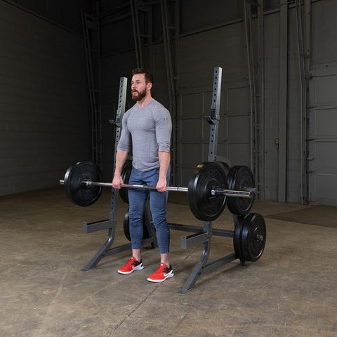 MAn uses POWERLINE MULTI-PRESS RACK in warehouse setting