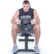 Rob Gronkowski holds Multi-Grip Virgin Rubber Olympic Plates