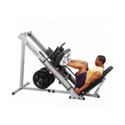 Male athlete uses Body-Solid GLPH1100 Leg Press & Hack Squat for leg press. 