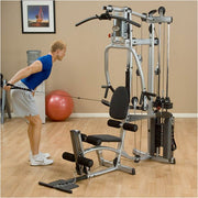 Male athlete does cable row exercise with Powerline Single Stack Home Gym P2X