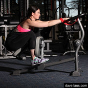 Female athlete uses Element TITANIUM Commercial Stretch Machine