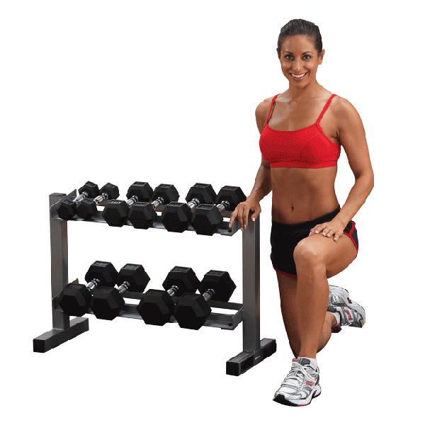 Female athlete kneels next to Body Solid Powerline Dumbbell Storage PDR282X with rubber weights. 