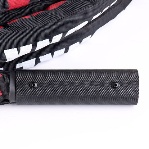 Close up of Xtreme Monkey black battle rope handle. 